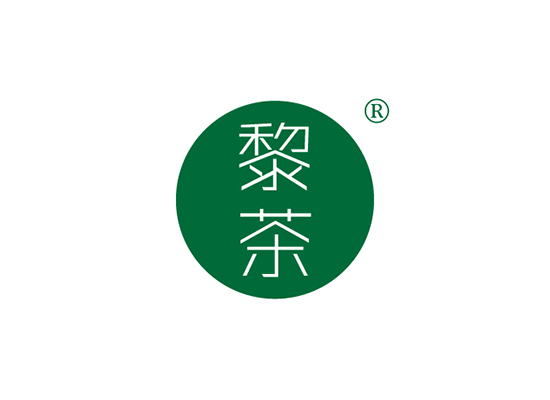 黎*